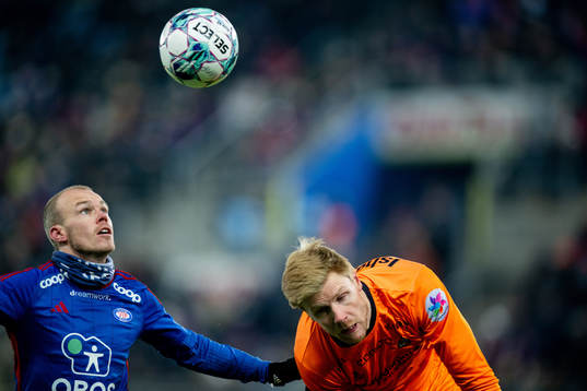 Petter Strand of Vålerenga and goalkeeper Jakob Let
