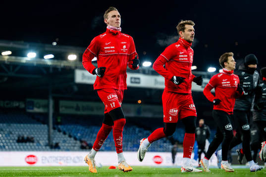 Joachim Soltvedt and Fredrik Pallesen Knudsen of Brann warm up ahead of the Eliteserien football match between Strømsgodset and Brann on December 3, 2023 in Drammen. 