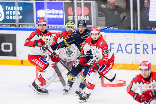 HV71s Simon Önerud  framför Frölundas målvakt Lars