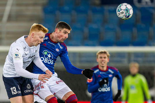 Marius Berntsen Olsen of Kristiansund and Andrej Ilic of Vålerenga