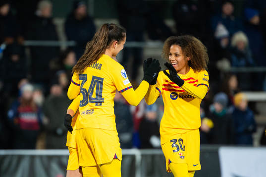Martina and Vicky Lopez of Barcelona celebrate