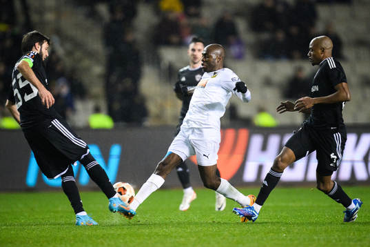 Edward Chilufya of Häcken against Badavi Huseynov and Julio Romao of Qarabag