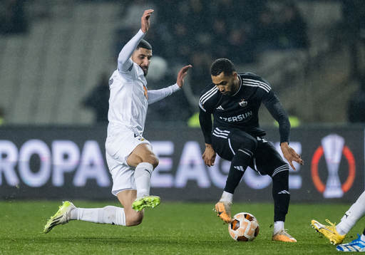 Aiham Ousou of Häcken and Juninho of Qarabag
