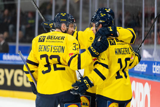 Lucas Wallmark of Sweden celebrates with team mates