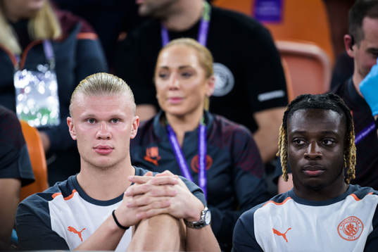 Erling Braut Haaland and Jeremy Doku of Manchester City in the stands