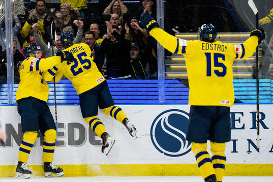 Elias Pettersson and Otto Stenberg of Sweden celebrate the