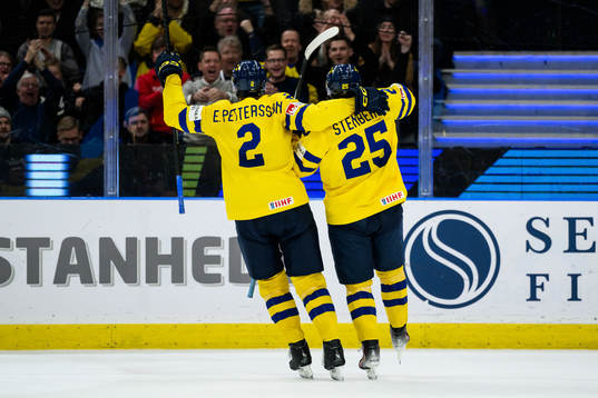 Elias Pettersson and Otto Stenberg of Sweden celebrate the