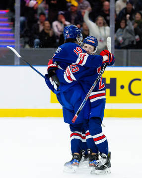 Cutter Gauthier of USA celebrates scoring 3-2 with team