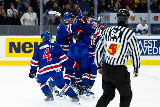 Cutter Gauthier of USA celebrates scoring 3-2 with team