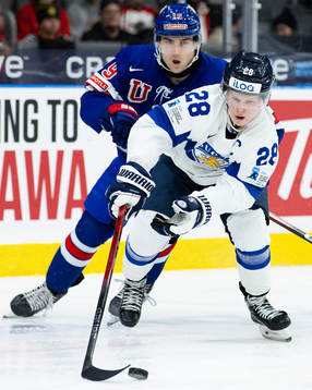 Cutter Gauthier of USA and Jere Lassila of Finland