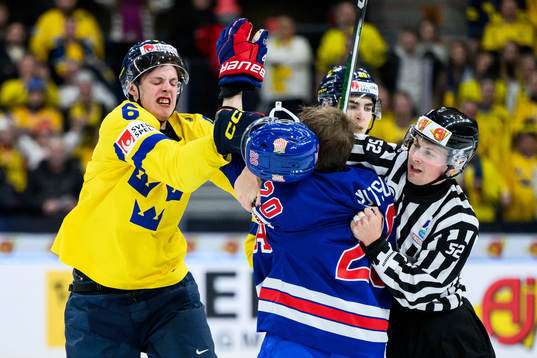 Anton Johansson of Sweden fights Lane Hutson of USA