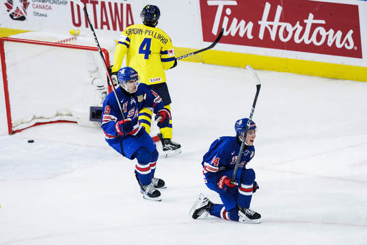 Cutter Gauthier and Gabe Perreault of USA celebrate the 1-0