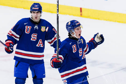 Cutter Gauthier and Gabe Perreault of USA celebrate the 1-0