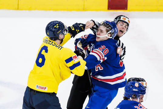 Anton Johansson of Sweden fights Lane Hutson of USA