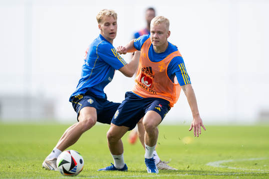Victor Larsson and Otto Rosengren of the Swedish men's football national team at a training session