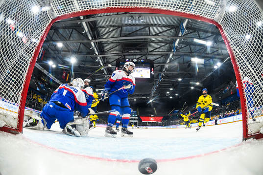 Anna Brenkle of Sweden (not in picture) scores 3-4 behind