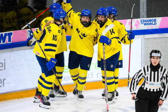 Anna Brenkle of Sweden celebrates with teammates