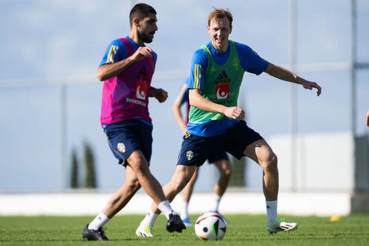 Rami Al Hajj and Adam Carlén of the Swedish men's football national team at a training session