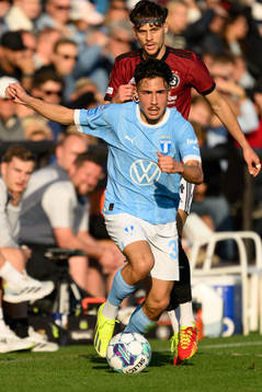 Veljko Birmancevic of Sparta Prag and Adrian Skogmar of