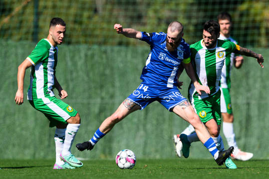 Abdelrahman Boudah Saidi and Nahir Besara of Hammarby against Jo Inge Berget of Sarpsborg 08