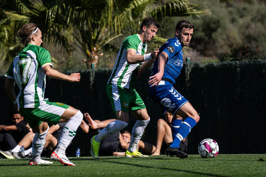 Jeppe Andersen of Sarpsborg 08 against August Mikkelsen and Viktor Djukanovic of Hammarby