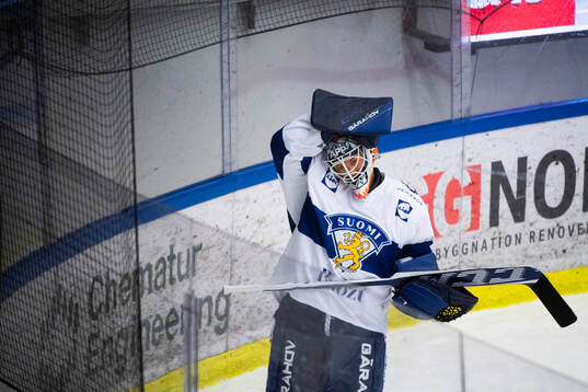 Goalkeeper Emil Larmi of Finland