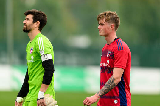 Goalkeeper Jimmy Maurer and Mads Westergren of Dallas