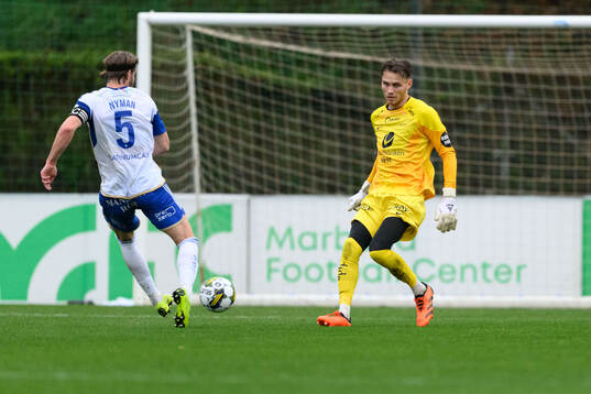 Christoffer Nyman of IFK Norrköping and Goalkeeper Martin Børsheim of Brann