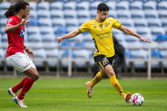 Robin Østrøm of Silkeborg and Dion Krasniqi of Elfsborg