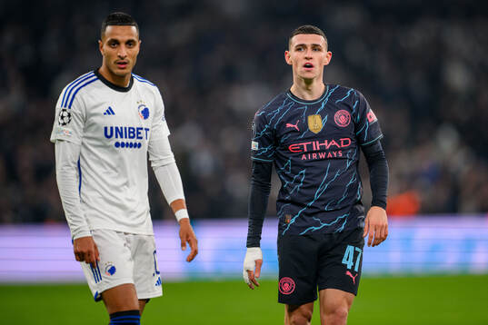 Elias Achouri of FC Copenhagen and Phil Foden of Manchester