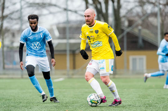 Falkenbergs FFs Christoffer Carlsson och Malmö FFs Mubarak Mohamud Nuh