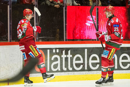 MoDos Mikkel Aagaard och Sam Vigneault jublar