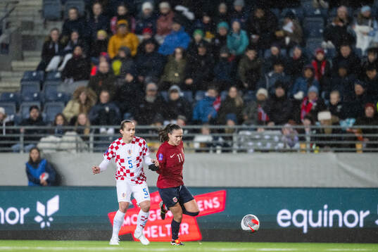 Kristina Nevrkla of Croatia and Guro Reiten of Norway