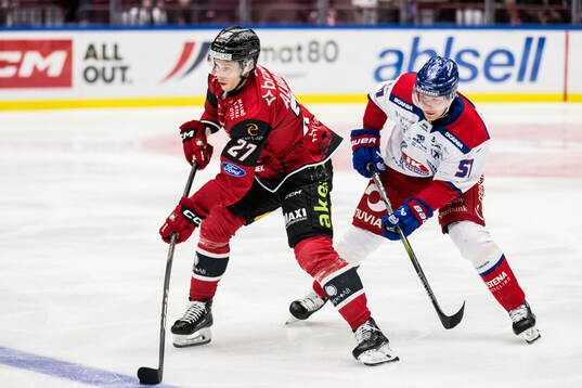 Malmö Redhawks Robin Alvarez och Oskarshamns Markus Nenonen