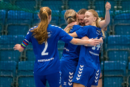 Andrea Holm Aune of Tiller celebrates after scoring the 2-1 goal