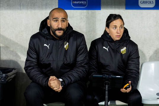 Head coach Mak Lind and assistant coach Bri Campos of