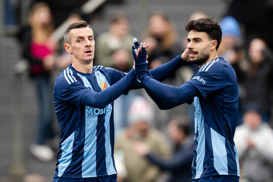 Djurgårdens Haris Radetinac och Deniz Hummet  jublar