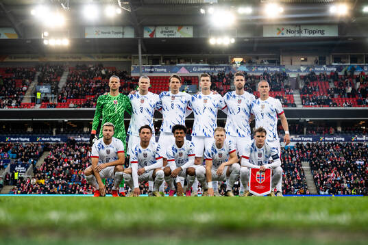 The starting eleven of Norway pose for a team photo