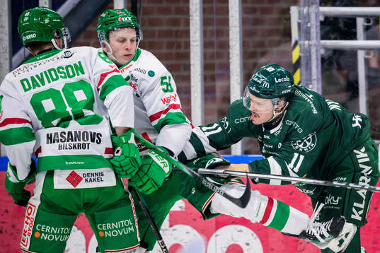 Rögles Adam Engström och Färjestads Joakim Nygård