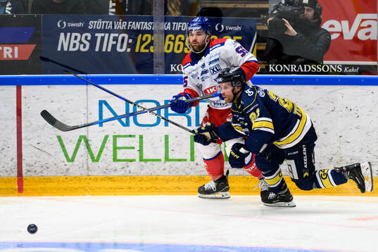 David Quenneville och HV71s Mattias Tedenby