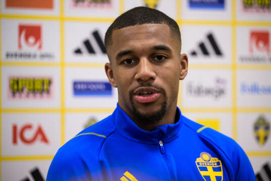 Isak Hien of the Swedish men's national football team in mixed zone
