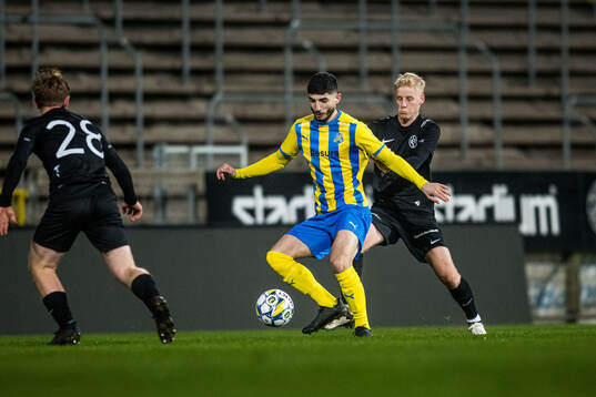 Eskilsminne IFs Adham Hazime och Landskrona BOISs Emil Lindman