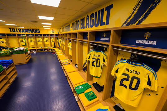 Jerseys of hospitalized Swedish player Kristoffer Olsson hanging in the dressing room of Sweden ahead of the international friendly football match between Sweden and Albania on March 25, 2024 in Stockholm. 