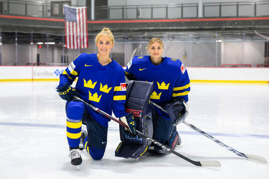 Emma Forsgren and goaltender Ida Boman of Sweden at a team