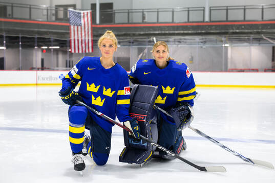 Emma Forsgren and goaltender Ida Boman of Sweden at a team