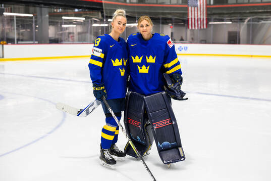 Wilma Sundin and goaltender Ida Boman of Sweden at a team