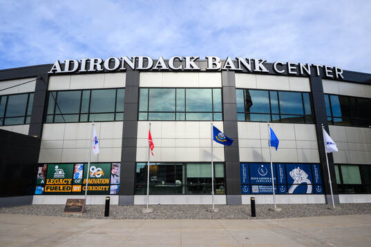 Exterior view of Adirondack Bank Center at a team photo