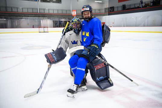 Goaltender Ida Boman and Josefin Bouveng of Sweden at a