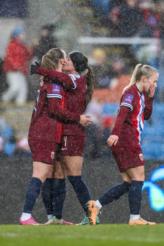 Elisabeth Terland and Tuva Hansen of Norway celebrate after 4-0