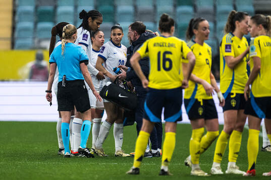 Delphine Cascarino of France in pain